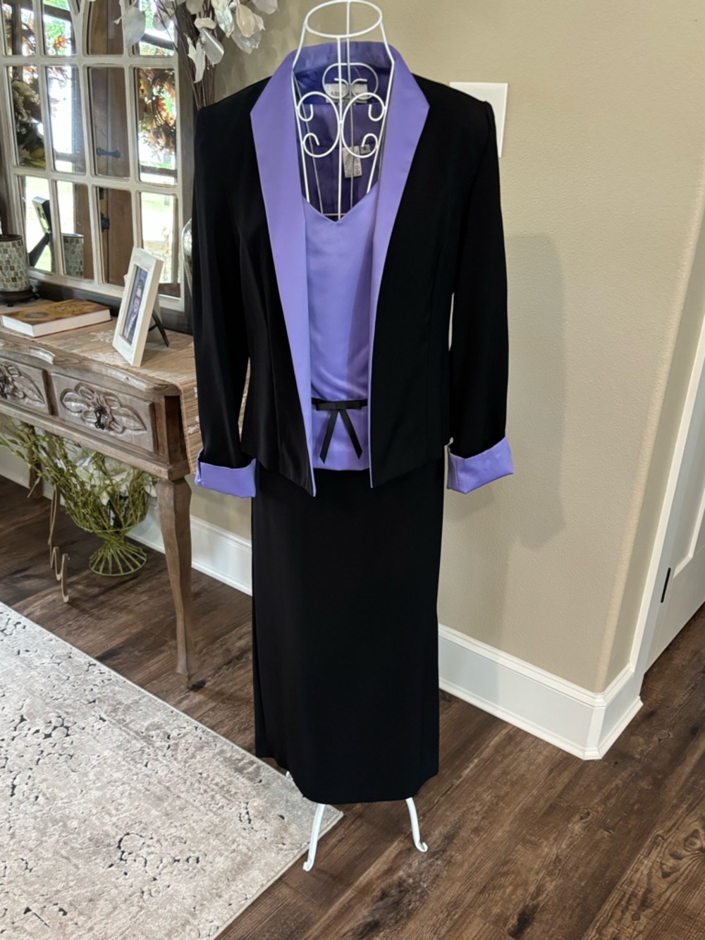 Black Jacket with Lavender Trim Women’s Blazer, lavender shell and black skirt.
